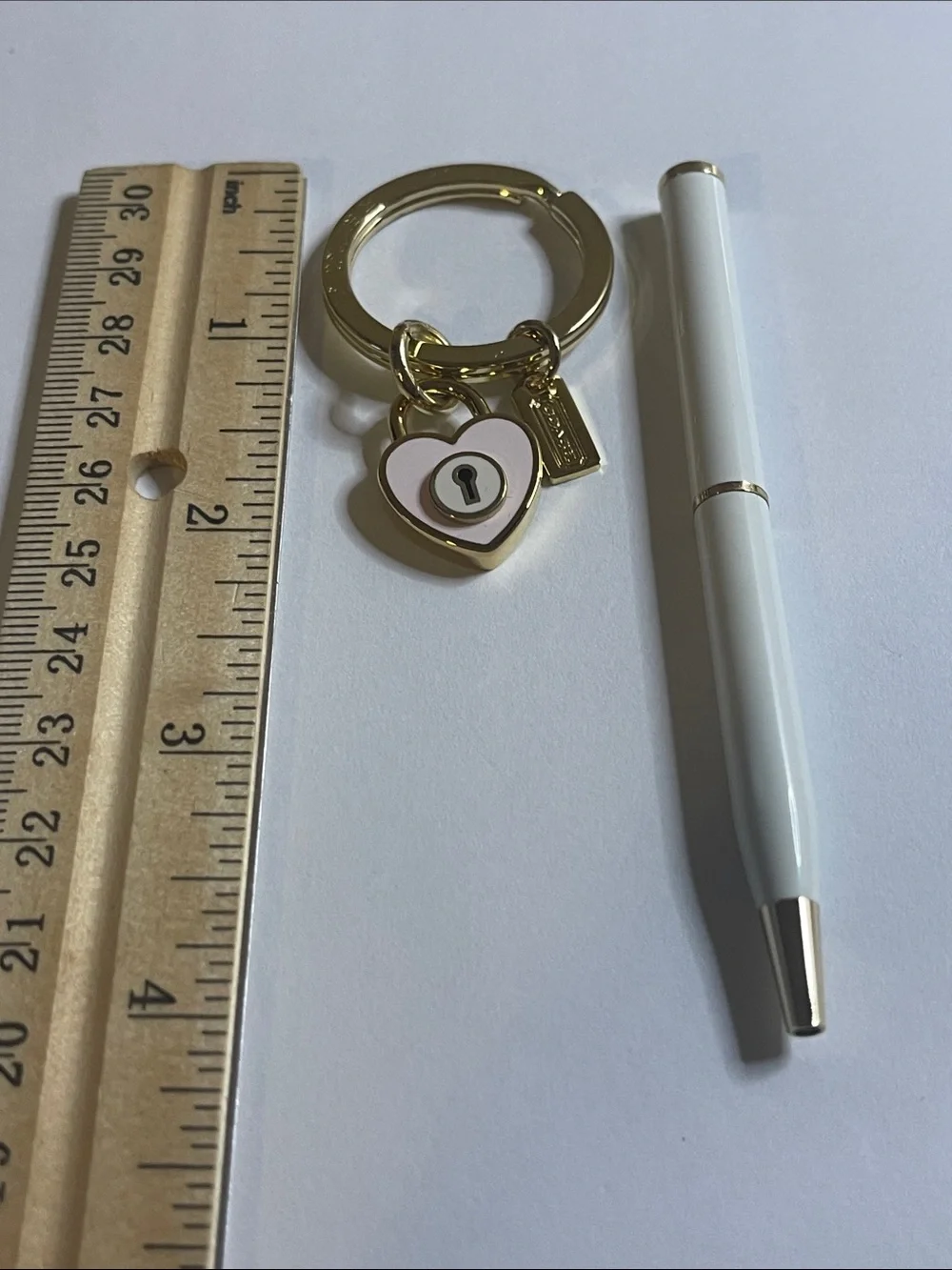 Coach Gold Heart Lock Keychain with Pink Enamel Accent and Coach Pen